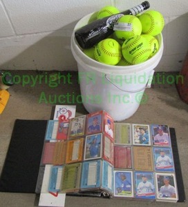lot 37 image: Assorted baseball cards in binder and bucket full of softballs plus