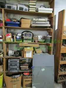 lot 60 image: Assorted industrial parts and hardware including time stamp clocks and more as shown