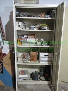 lot 64 image: Metal double door storage cabinet 74 x 36 x 19 and contents as shown