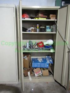 lot 65 image: Metal double door storage cabinet 74 x 36 x 19 and contents as shown