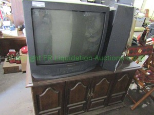 lot 125 image: TV cabinet and retro TVs