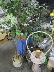 lot 140 image: Artificial plants and candle stands