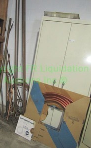 lot 63 image: Assorted copper piping including large & small roll of copper as shown