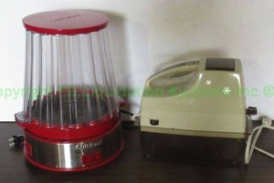 lot 209 image: Cuisinart popcorn maker and Oster snowflake ice crusher