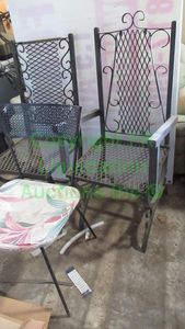 lot 227 image: Wrought iron patio chairs