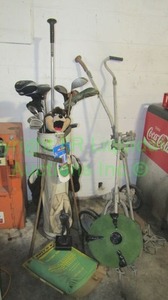 lot 166 image: Golf clubs and golf accessories as shown
