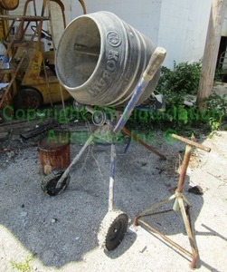 lot 412 image: Kobalt cement mixer and extension stand