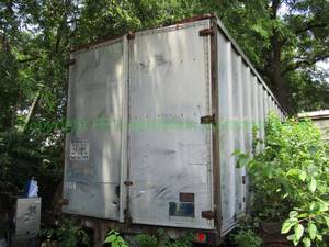 lot 423 image: Semi-truck trailer plus contents