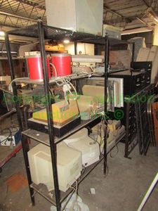 lot 316 image: ALL CONTENTS ON SHELF UNIT INCLUDING MONITORS, CASH REGISTERS, PLASTIC WRAP AND MORE