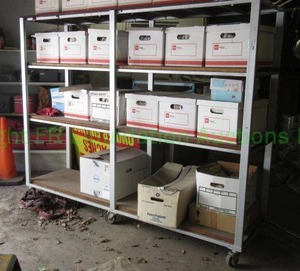 lot 353 image: LARGE METAL SHELF WITH ROLLERS