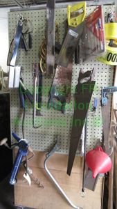 lot 339 image: ASSORTED TOOLS INCLUDING HAND SAWS, CAULKING GUNS AND MORE
