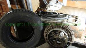 lot 334 image: DUNLOP RADIAL ROVER TIRE, SNAKE DRAIN CLEANER AND MORE