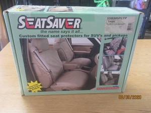 lot 139 image: COVERCRAFT SEAT SAVER SS8385PCTP (TAUPE)&nbsp2009-2010 DODGE RAM 1500 CREW CABQUAD CAB - 2ND ROW 6040 SEAT WITH 3 ADJ HDRSTS &amp ARM RSTCUP HOLDER&nbsp