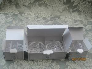 lot 182 image: TOTAL OF 3 BOXES WMF CRYSTAL LEAD 24% PBO STRAIGHT MINI CANDLE HOLDERS&nbsp2 SMALL BOXES HAVE 3 CANDLE HOLDERS EACH&nbsp1- LARGE BOX HAVE 2 CANDLE HOLDERS&nbsp&nbspTOTALLING 8 CANDLE HOLDER&nbsp