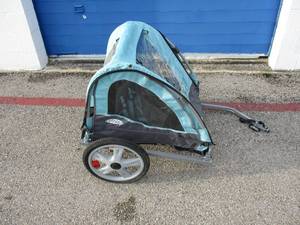 lot 57 image: Instep Bike Trailer For Kids, Or Pets