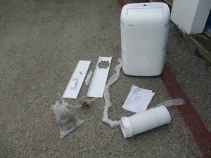 lot 24 image: Like New Toshiba 10,000 BTUhr. Portable Room AC Unit With Remote