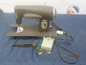 lot 1 image: VINTAGE KENMORE E-6354 SEWING MACHINE