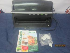 lot 20 image: FOOD SAVER WITH MANUAL AND RECIPE BOOK MODEL V3250