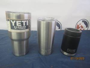 lot 33 image: 2 YETI TUMBLERS AND 1 YETI CAN COOLER ALL ARE NEW