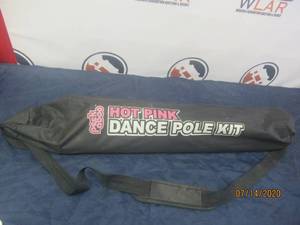 lot 66 image: PEEK A BOO HOT PINK DANCE POLE KIT WITH CARRY BAG
