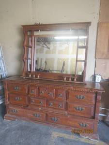 lot 227 image: ANTIQUE WOOD 8 DRAWER DRESSER AND MIRROR&nbsp70 L X 18 X 33 H&nbsp- MIRROR NEEDS TO BE REPAIRED BACK ON&nbsp