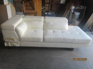 lot 247 image: WHITE LEATHER SECTIONAL WITH 2 HIDDEN STORAGES&nbsp92 L X 42 X 19 H (SEAT)- DAMAGE TO LOWER&nbsp ARM OF SECTIONAL SEE PIC &nbsp