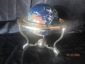 lot 296 image: UNIQUE ART TABLE TOP BLUE OCEAN WORLD GLOBE WITH GOLD TRIM TRIPOD STAND