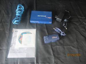 lot 334 image: DUO NETGEAR PRODUCTS NETGEAR WIRELESS READY PRINT SERVER PS111W&nbsp &amp&nbsp NETGEAR PA101 10MBPS HPNA HOME PHONE LINE USB ADAPTER RJ-11 SPECS