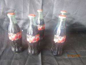 lot 335 image: TOTAL OF 5 VINTAGE 1197 CHRISTMAS COCA COLA CLASSIC COLLECTOR BOTTLES&nbsp
