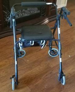 lot 27 image: ROLLATOR WALKER WITH FOLD UP SEATSTORAGE