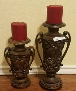 lot 74 image: LOT OF 2 CARVED STYLE CANDLE HOLDERS WITH CANDLES (14.5 H AND 11.5 H)
