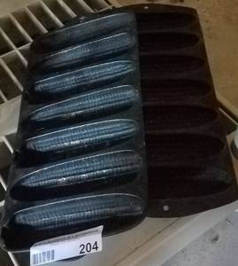 lot 204 image: VINTAGE CAST IRON CORN BREAD PANS (BIDDING BY THE PIECE)