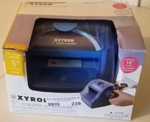 lot 239 image: XYRON 5 INCH CREATE-A-STICKER CUTTER IN BOX