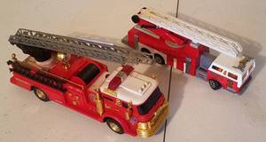 lot 256 image: VINTAGE FIRE ENGINE TOY TRUCKS (BIDDING BY THE PIECE)
