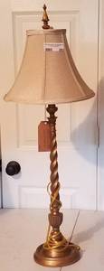lot 283 image: GOLD SPINDLE LAMP WITH SHADE (34 HIGH)