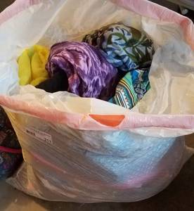 lot 311 image: BAG FULL OF ASSORTED CLOTHING