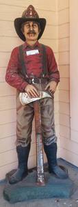 lot 456 image: LARGE FIREMAN SCULPTURE WITH THERMOMETER (16.5 W x 43 H x 11 D)