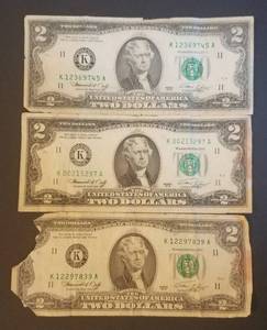 lot 584 image: LOT OF 3 $2 BILLS