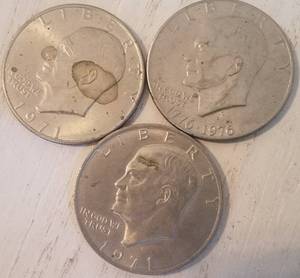 lot 587 image: LOT OF 3 ONE DOLLAR COINS