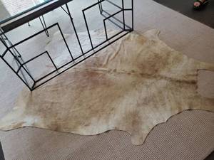 lot 23 image: Tan & Cream Animal Hide Area Rug