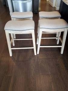 lot 55 image: Four Khaki Linen Blend Bar Stools