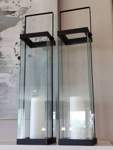 lot 57 image: Pair of Glass Candle Holders with Black Metal Frame