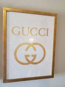 lot 134 image: Framed Gucci Print