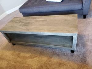 lot 152 image: Laminated Brown Coffee Table with Black Base