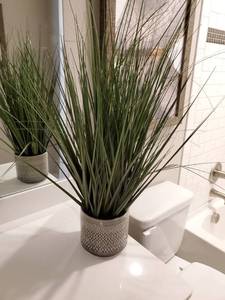 lot 165 image: Faux Greenery in Grey Ceramic Pot