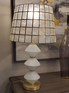 lot 36 image: Handcrafted Natural Capiz & Gold Finish Metal Table Lamp