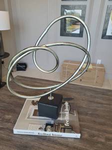 lot 1 image: Metal Sculpture on Resin Base with One Book