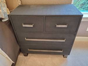lot 50 image: Black Burlap Coated 4 Drawer Nightstand by Revelation