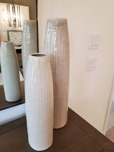 lot 85 image: Pair of Slender Light Tan Ceramic Vases