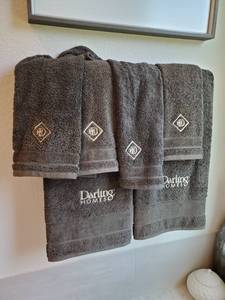 lot 103 image: Monogrammed 100% Cotton Grey Towels